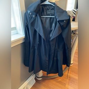 BCBG black nylon light weight jacket with some leather on the sleeves